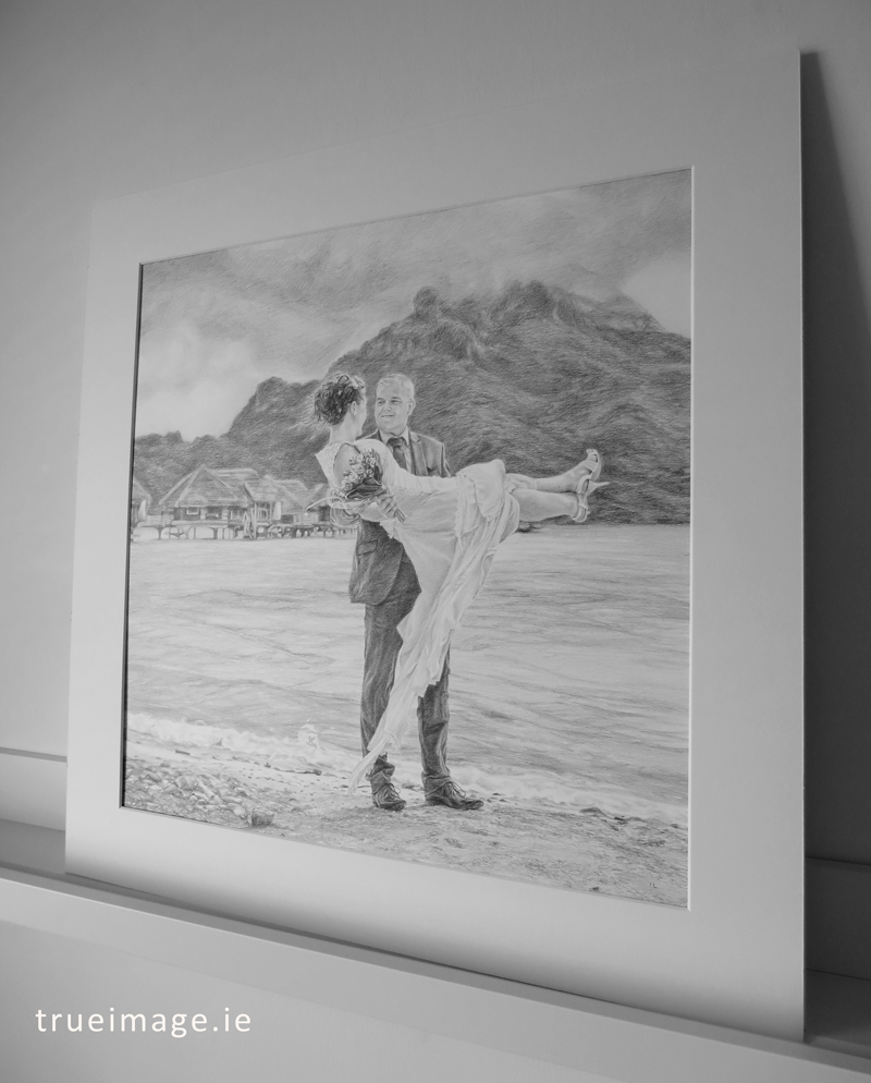 mounted pencil portrait of a bride and groom