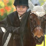 little boy on a pony painting