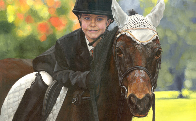 little boy on a pony painting