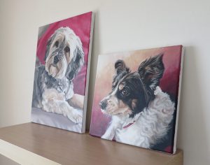 two dog painting canvases