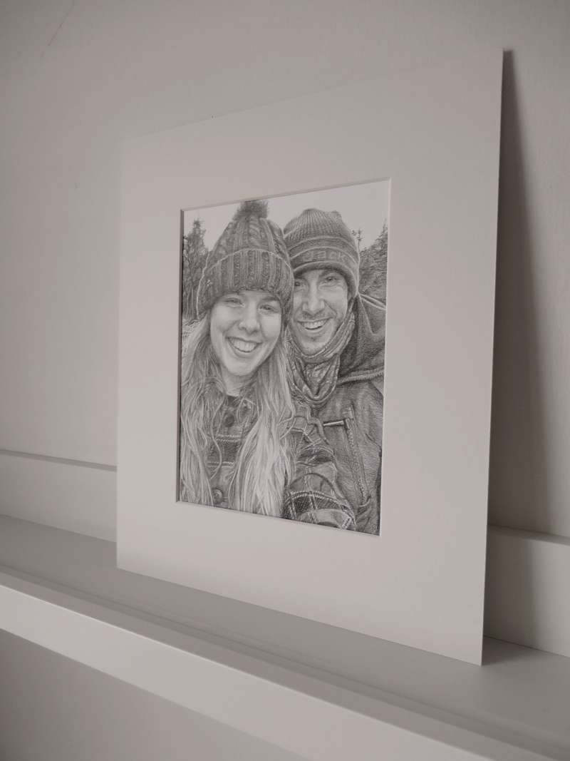 graphite pencil drawing of a happy couple