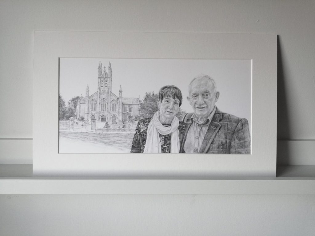 mounted pencil portrait of a couple