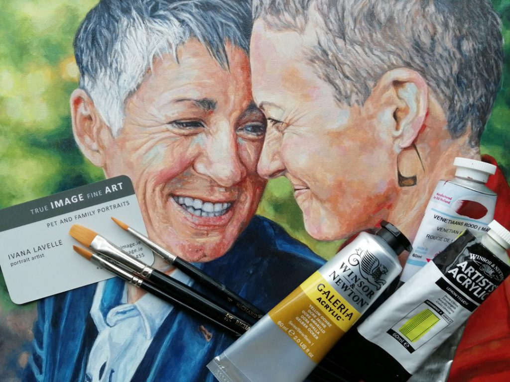 a commissioned painting of two women