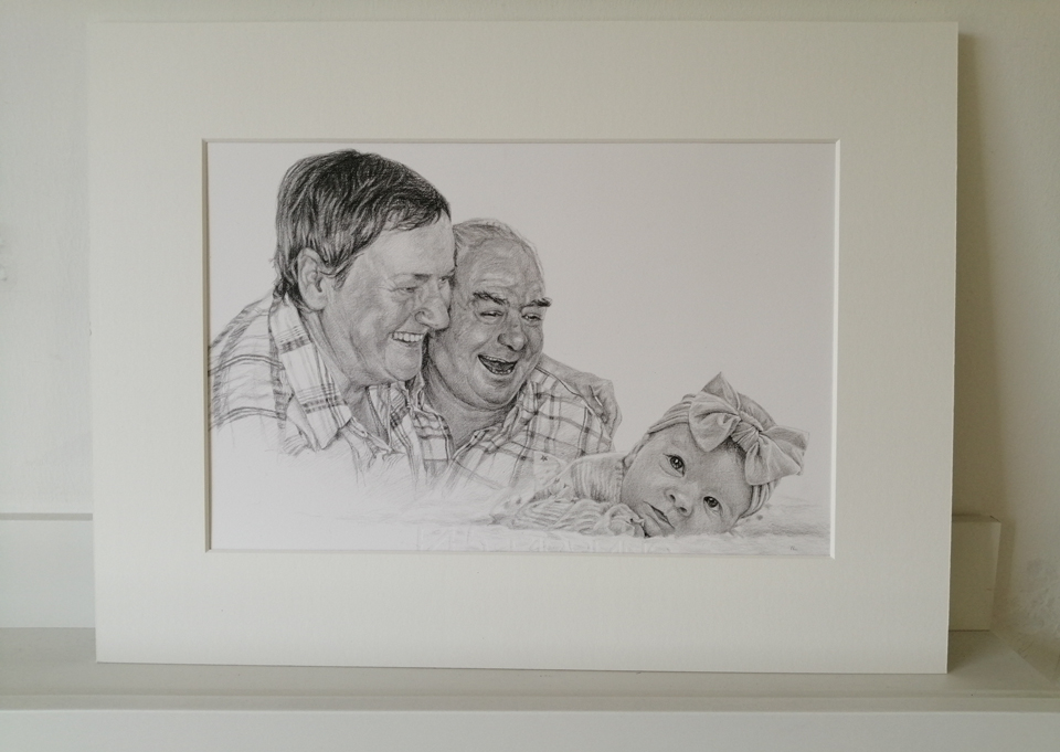 mounted pencil drawing of a family