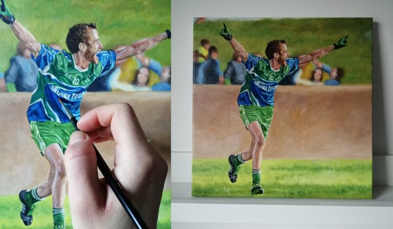 finishing an acrylic painting of a football player