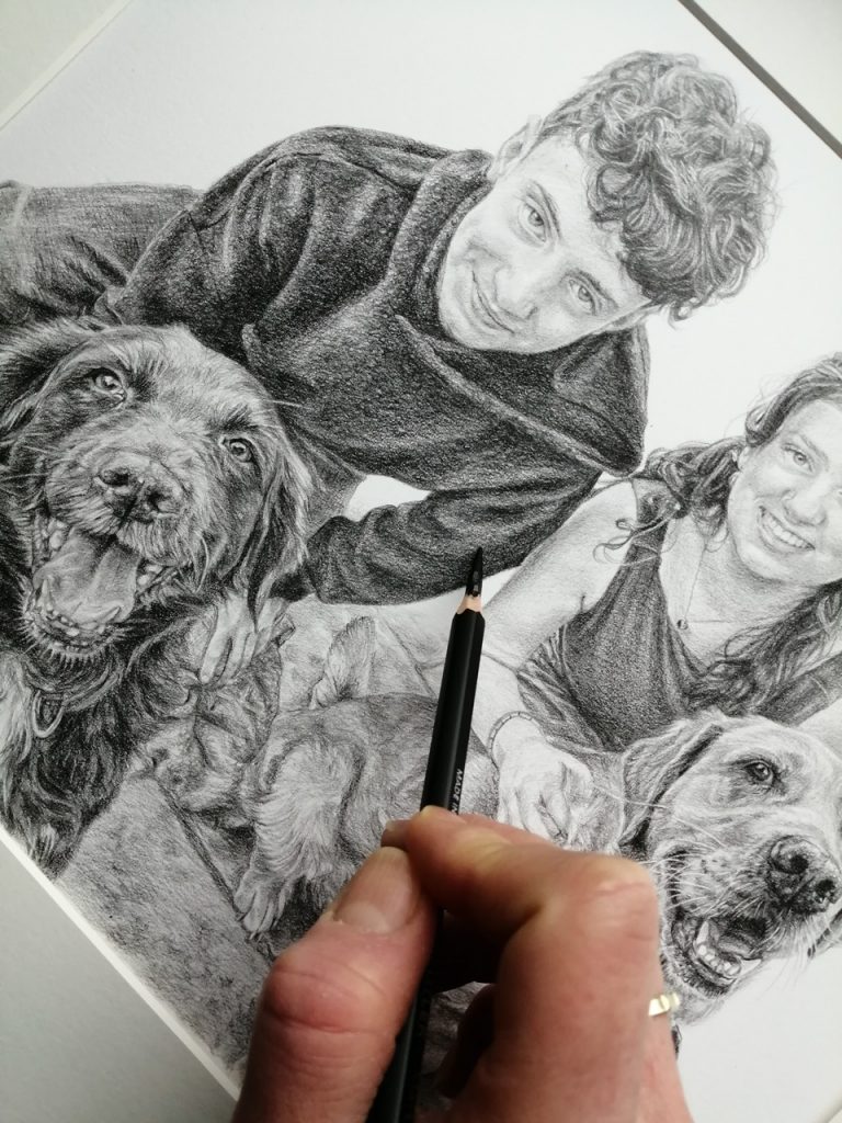 adding details to the pet and people portrait drawing by a portrait artist