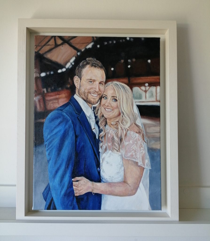 framed painting of a bride and groom at their wedding day