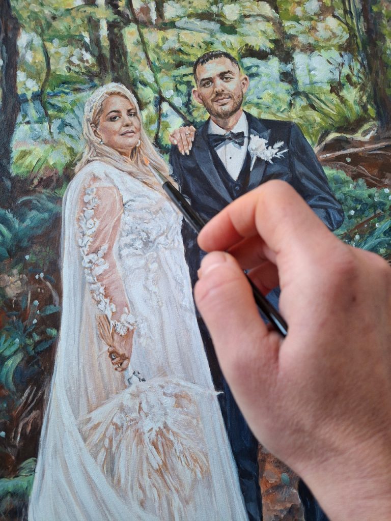 adding brush detail to a portrait painting in acrylic