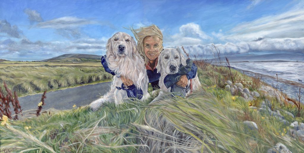 acrylic portrait painting of a smiling woman with two pet golden retriever dogs