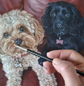 adding detail to a dogs' portrait painting
