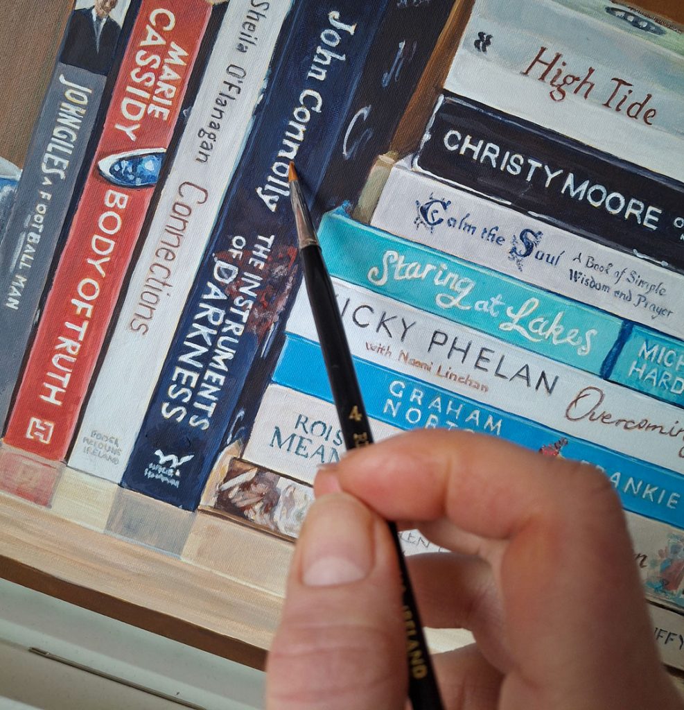 adding letter details to a painting of books