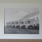 pencil drawing of trucks in a mount
