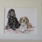 mounted portrait of two dogs