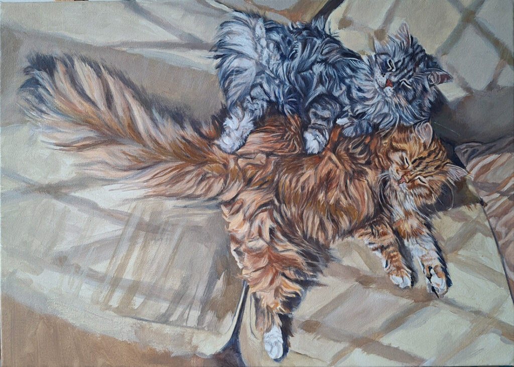 adding acrylic paint to the canvas painting of two cats