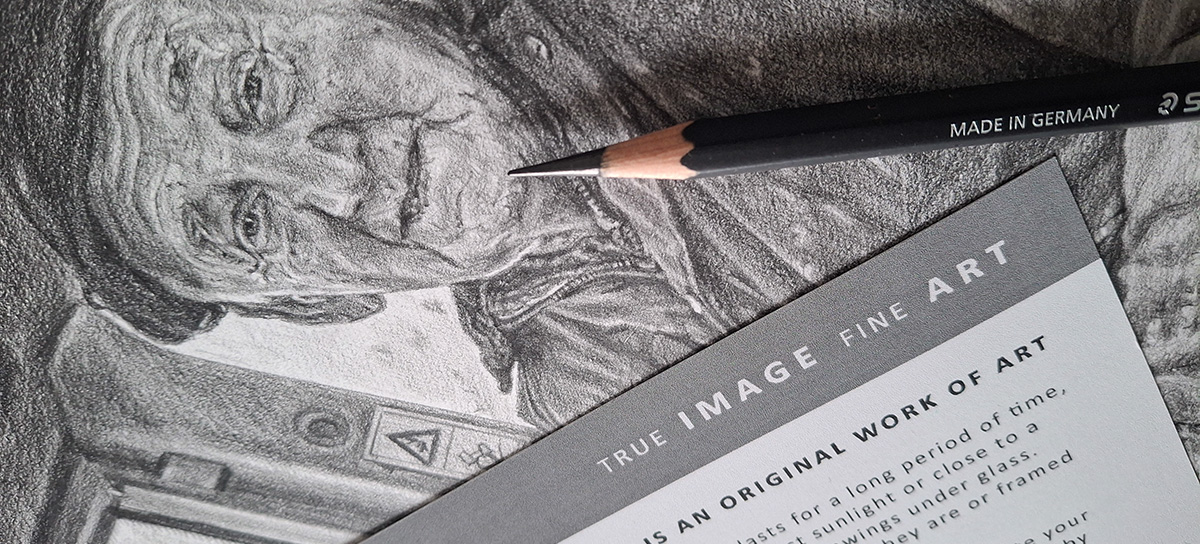 hand drawn pencil portrait of a man from photo with a pencil