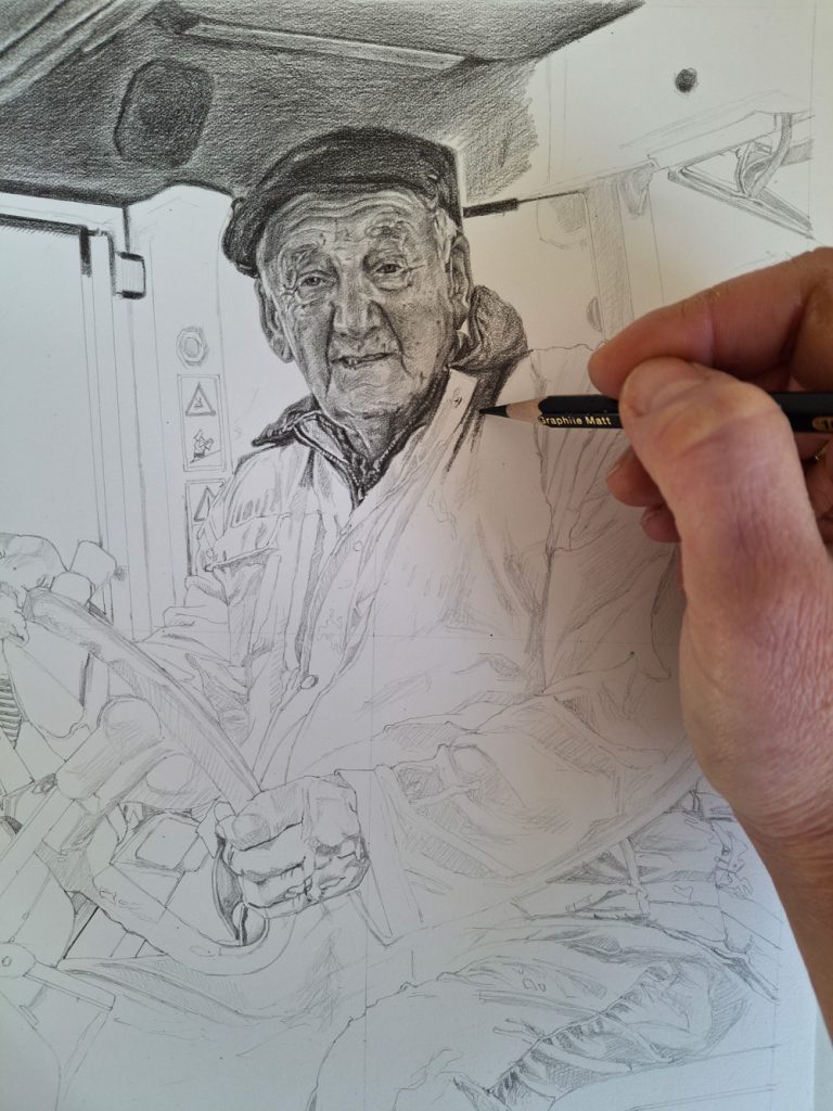 artist shading a portrait of a man