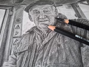 close up of a portrait drawing in pencil