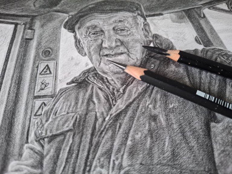 close up of a portrait drawing in pencil